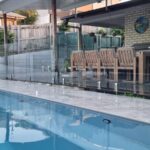 The polished spigots on Little Mountain's frameless glass bring a sense of refin...