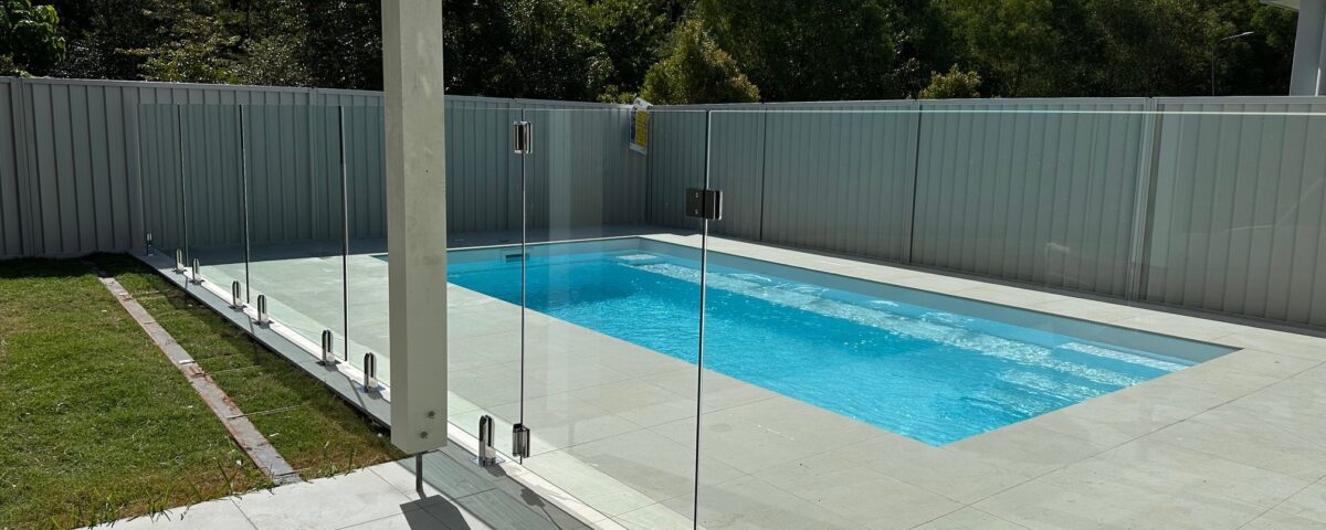 With all this blue sky the glass pool fence keeps rolling in...