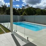 With all this blue sky the glass pool fence keeps rolling in...