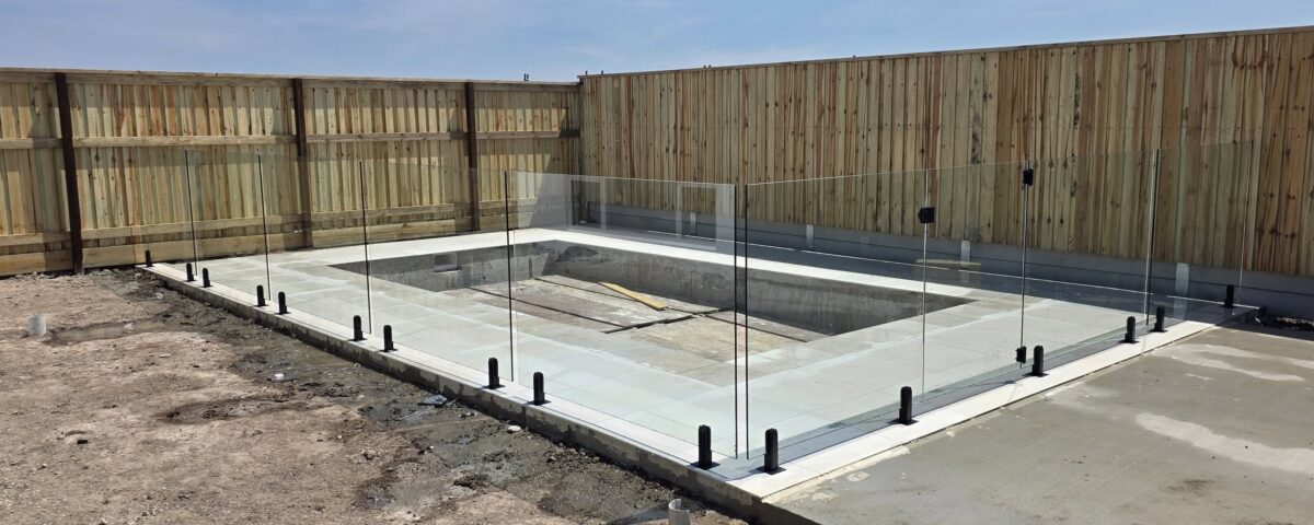 Perfect weather means perfect pool fences going up.