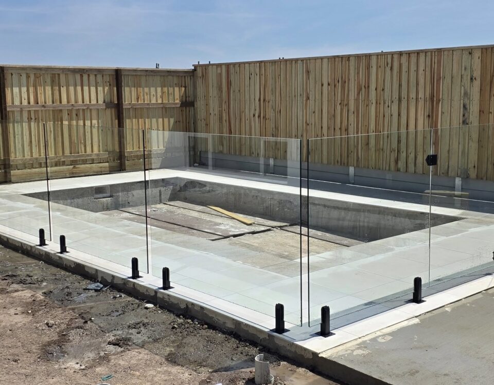 Perfect weather means perfect pool fences going up.