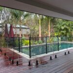 Part way through our deconstruction and upgrade to glass pool fencing on yesterd...