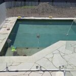 Custom raked glass with our frameless pool fence gate - one more job completed t...