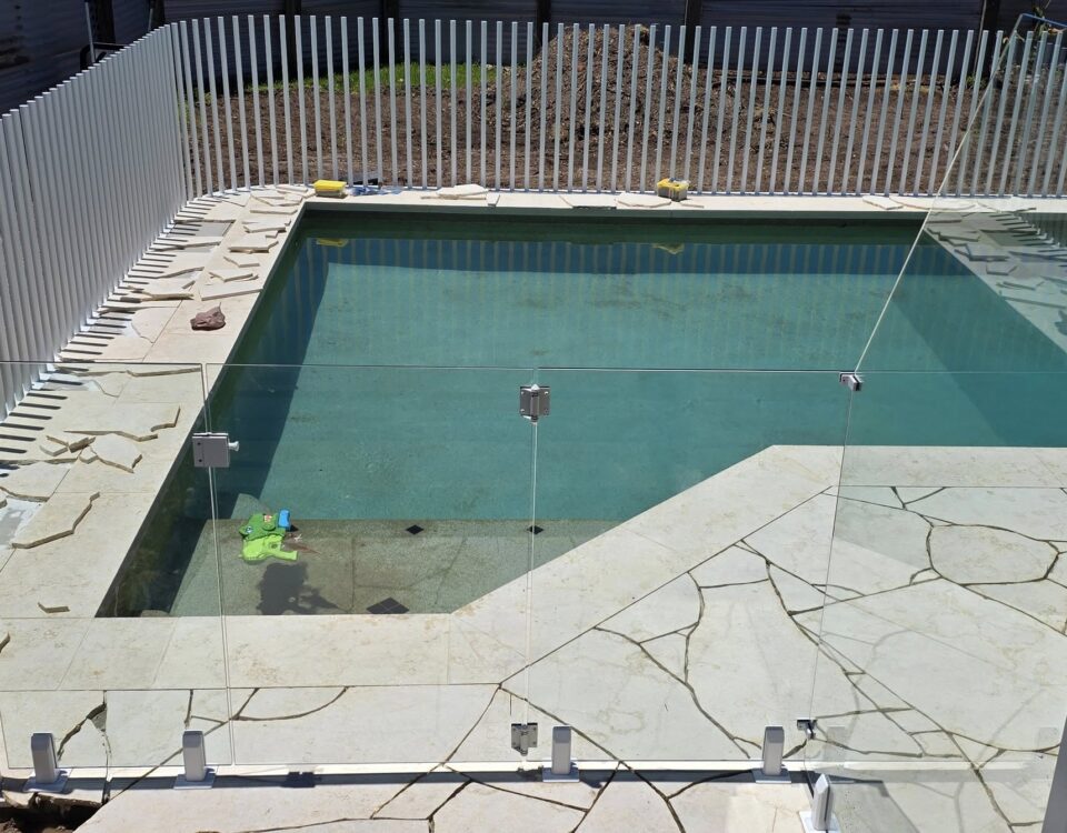 Custom raked glass with our frameless pool fence gate - one more job completed t...