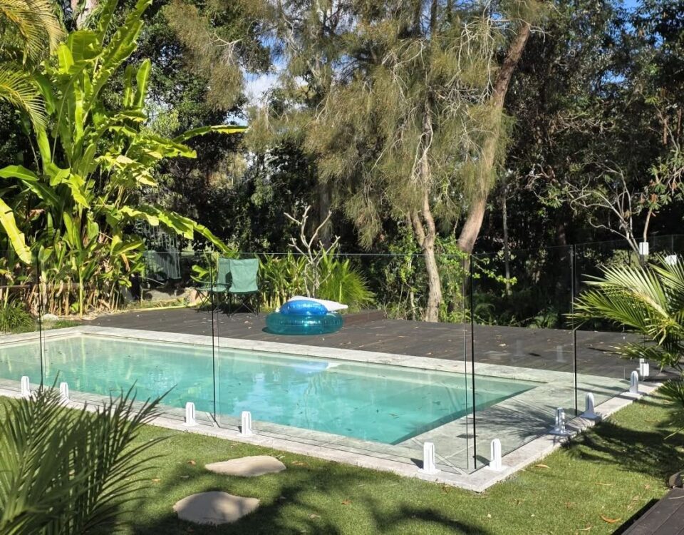 Sneaky peak into this beautiful back yard pool wrapped in our frameless glass po...
